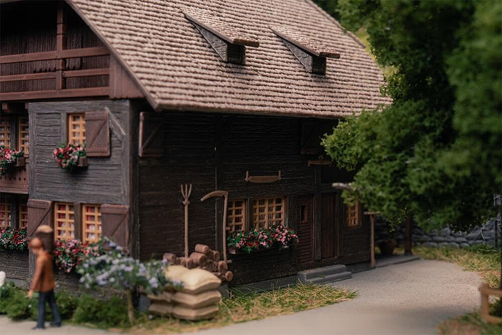 FALLER 130012 - Jubiläumsmodell Uhrenmacherhaus mit Figur - Spurweite H0