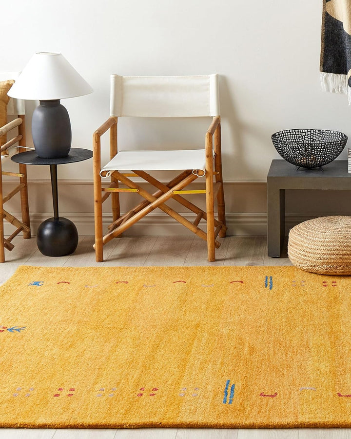 Gabbeh Teppich gelb aus Wolle 160x230 cm Hochflor mit Muster weich handgetuftet Akalan