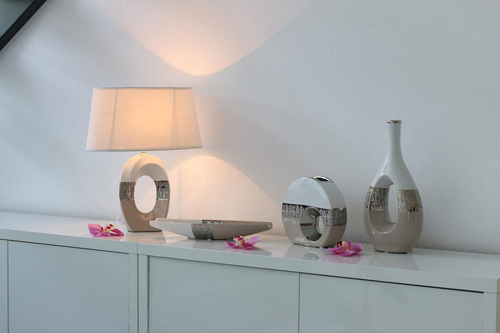 Dekohelden24 Moderne Deko Designer Keramik Vase oval mit Loch in Cappuccino/Silber/weiss. Masse L/B/