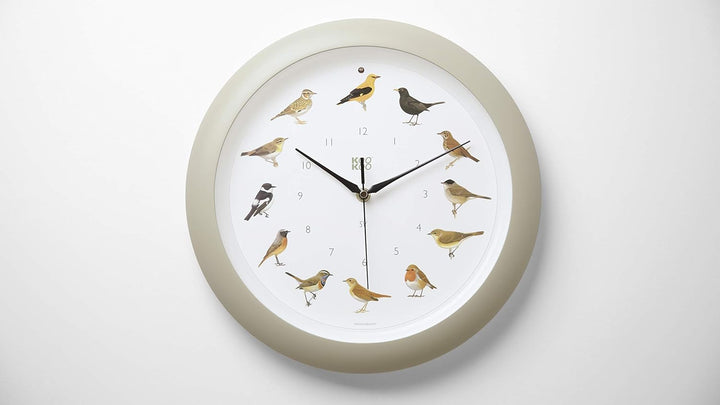 KOOKOO Singvögel Quarzwerk seiden-grau, Die Singende Vogeluhr, runde Wanduhr mit natürlichen Vogelst