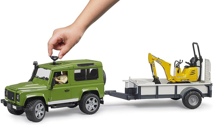 bruder 02593 - Land Rover Defender Station Wagon mit Einachsanhänger, JCB Mikrobagger 8010 Cts, Baua