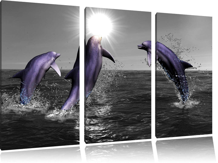 Fröhliche Delfine springen im Meer schwarz/weiss 3-Teiler Leinwandbild 120x80 Bild auf Leinwand, XXL