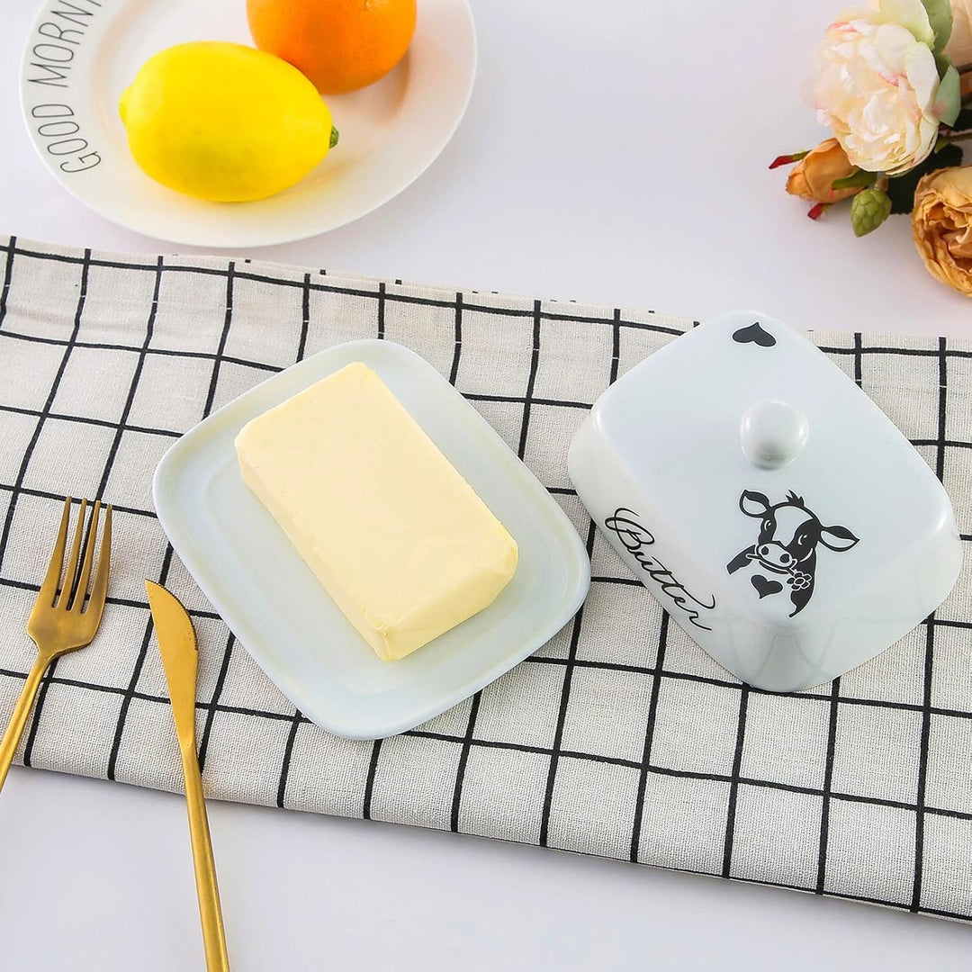 Butterdose mit Griff für 250g Butter, Hochwertige Keramik, Weiss mit Schwarzem Kuhkopfmuster, Porzel