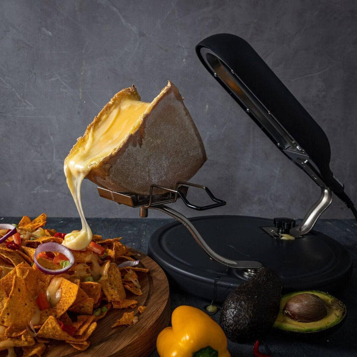 Boska Raclette Quattro Schwarz/Raclette Grill/Extra lange Schnur/Geschmolzener Raclette Käse/Schweiz