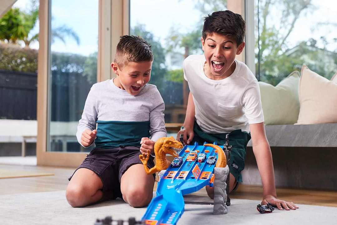Metal Machines 4-Tracks Dinosaurier Raptor Attack Spielset mit Mini-Rennwagen