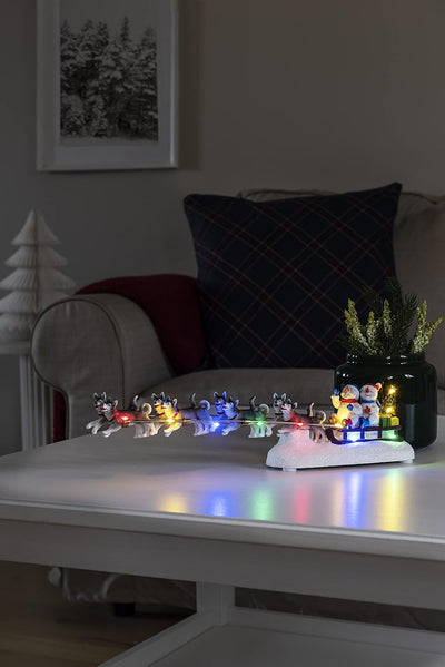 Konstsmide LED Szenerie"Schneemann mit Hundeschlitten", 6H Timer, 10 bunte Dioden, batteriebetrieben