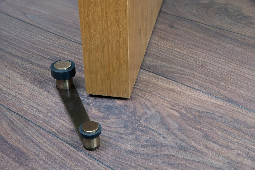 Türstopper mit drehbarem Halter | für Türstärke bis 100 mm | Messing | inkl. Schraube + Dübel | Ref.