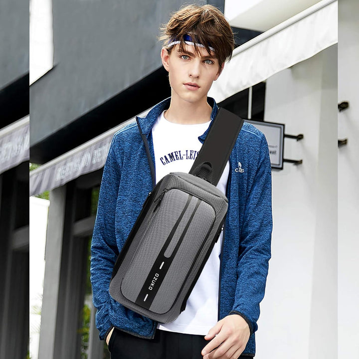 FANDARE Brusttasche Sling Rucksack Diebstahlsicherung Daypacks mit USB für Herren Damen Schultertasc