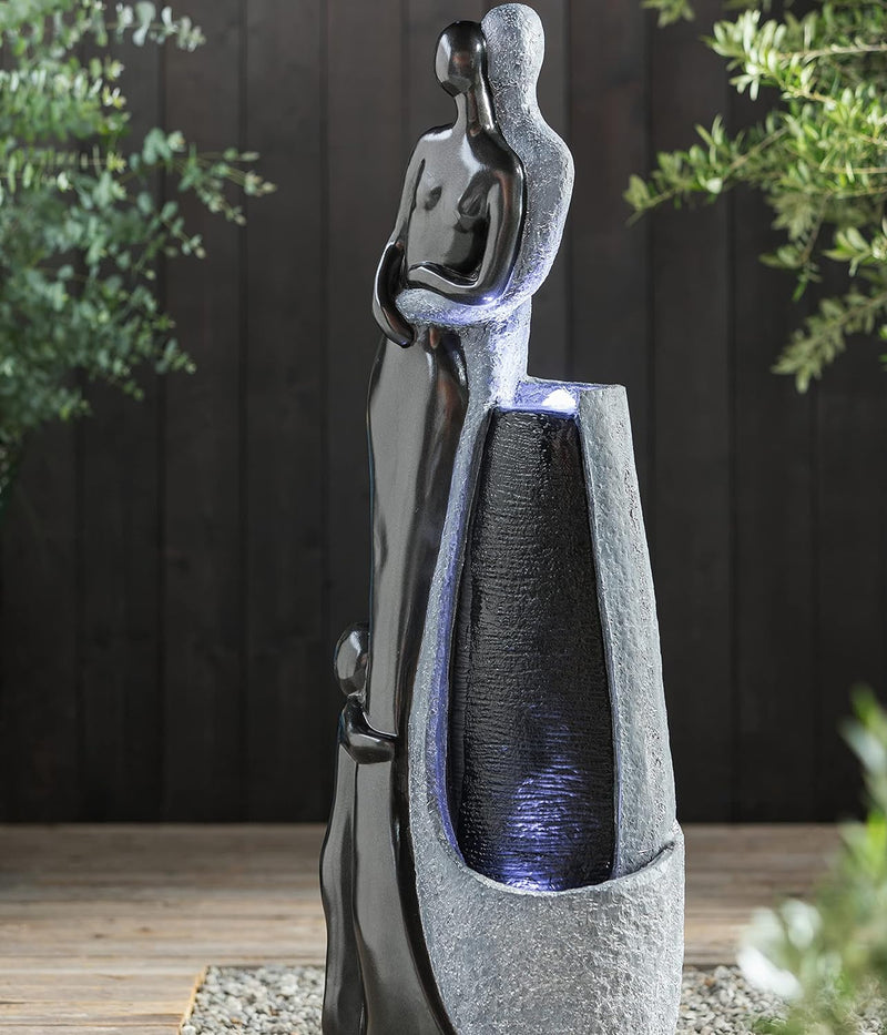 Dehner Gartenbrunnen Family mit LED Beleuchtung, ca. 120 x 42.5 x 27 cm, Polyresin, grau