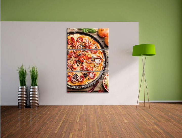 Pixxprint Leckere Pizza auf Holztisch / 3-Teilig/Gesamtmass 120cm Leinwandbild bespannt auf Holzrahm