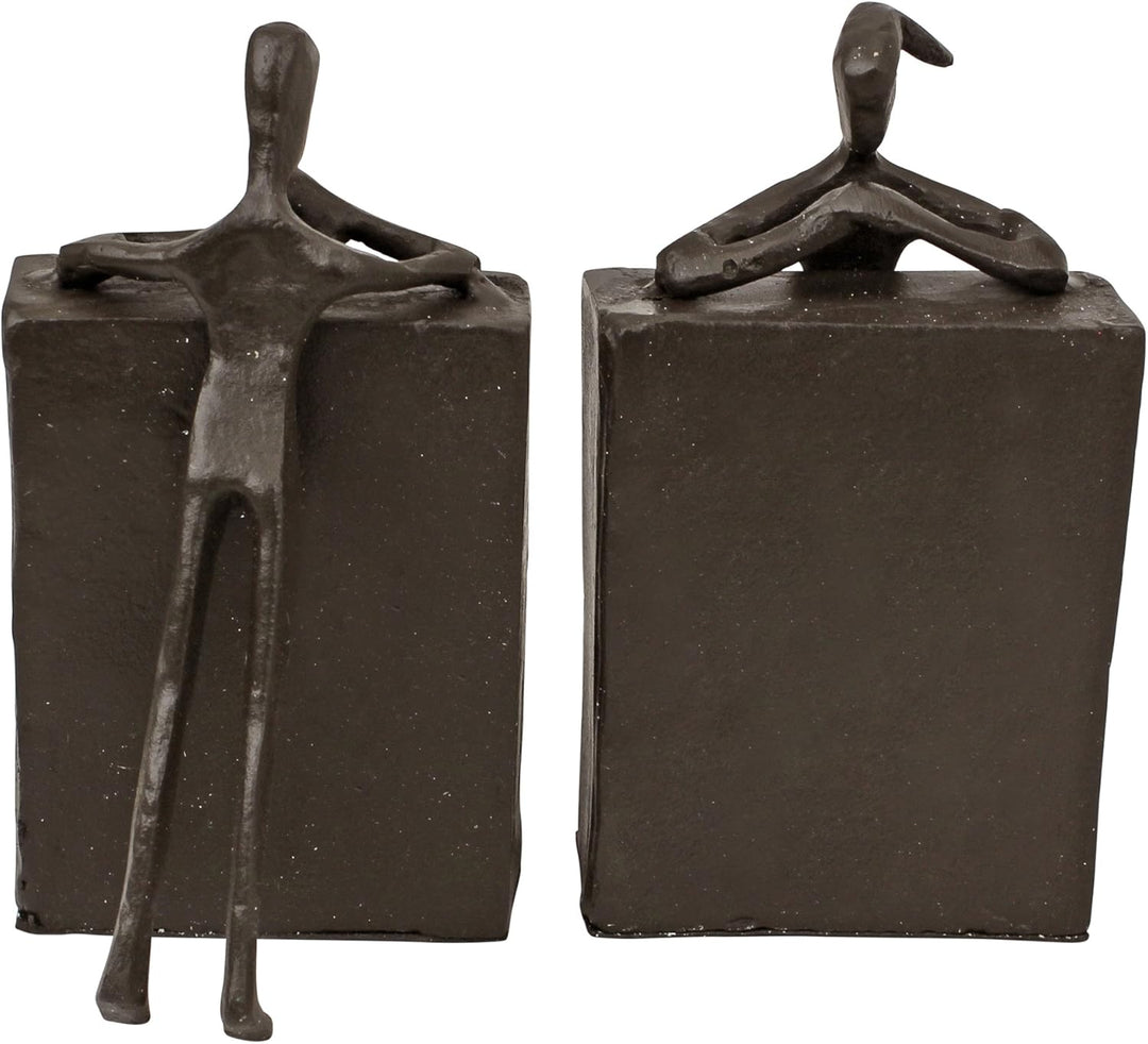 Design Toscano Über dem Buchregal, Figuren aus Eisenguss