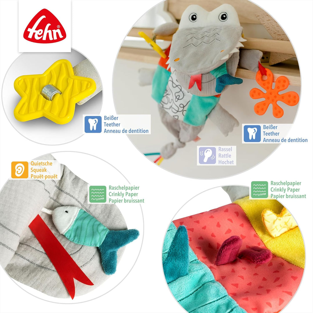 Fehn Handpuppe Baby Spielzeug Krokodil - Kuscheltier mit Rassel, Raschelpapier, Beisser und Quietsch