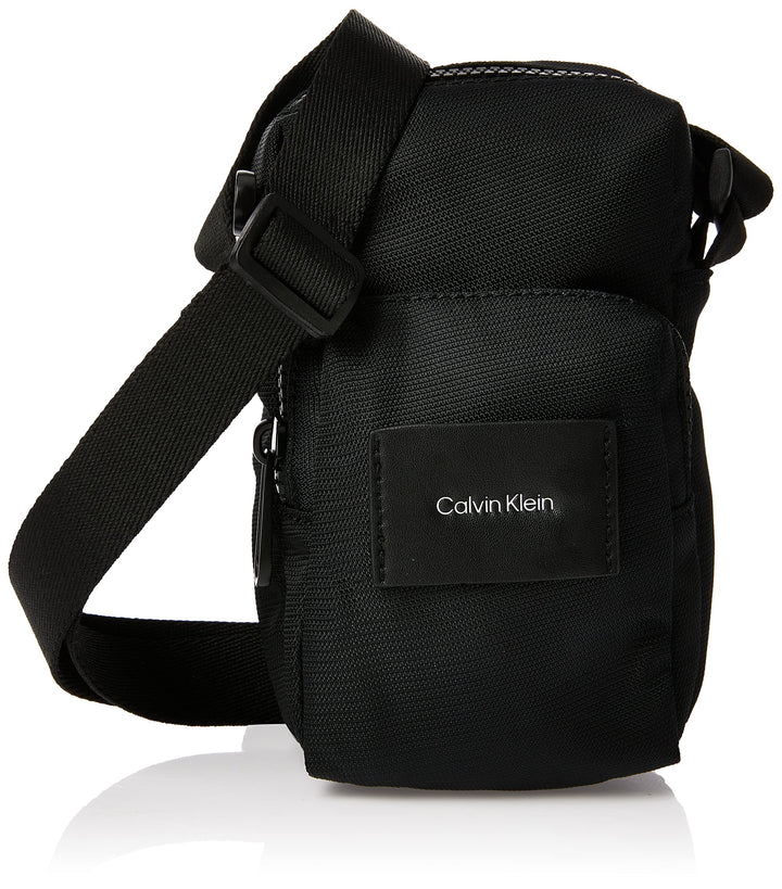 Calvin Klein Herren Must T Reporter Xs W/Pckt Crossovers, Ck Schwarz