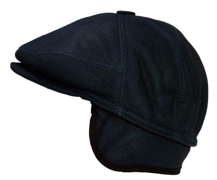 CUCUBA Shearling Herren-Mütze aus Schaffell - Mütze mit Visier und Ohrenklappen - Dunkelblau (L) 58,