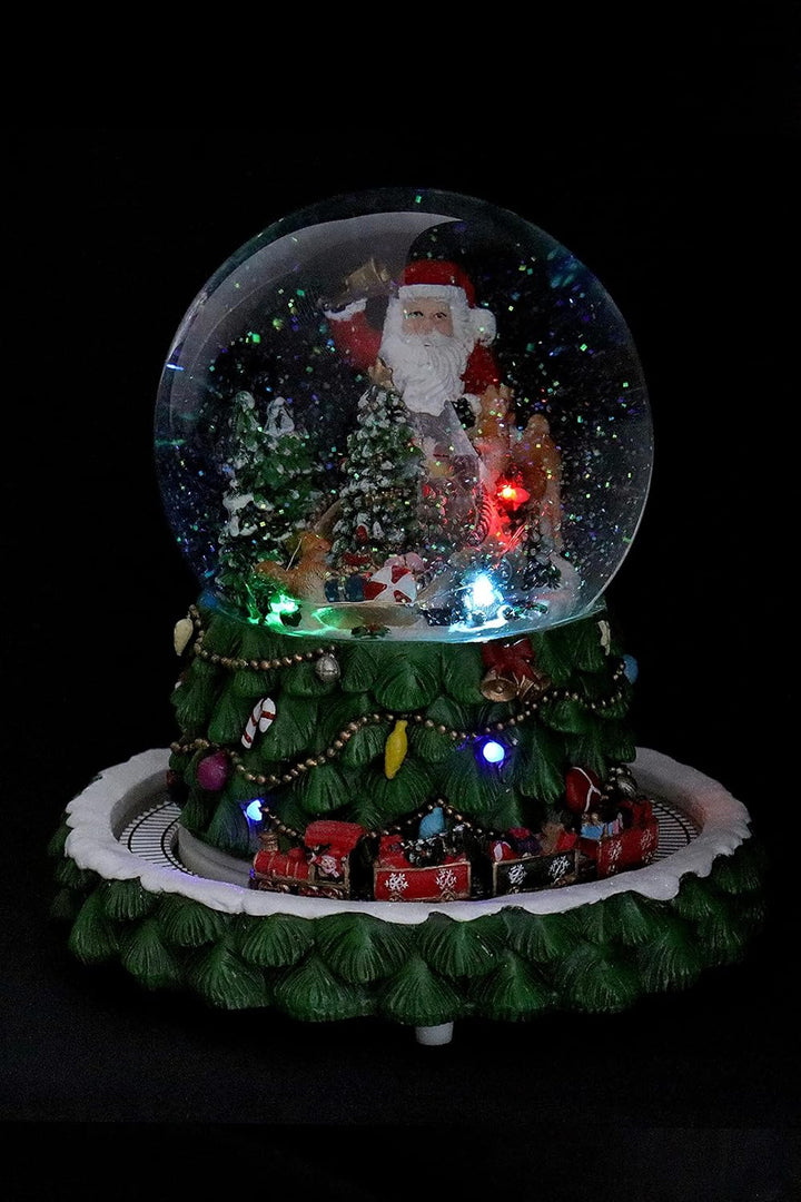 Schneekugel/Spieluhr Tannenbaum ⌀150mm, weihnachtlicher Sockel mit rotierendem Zug, Musik, Licht &amp; S