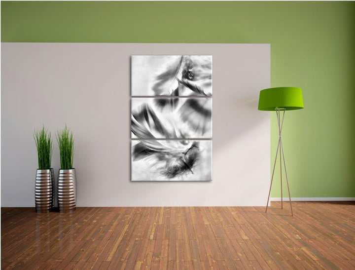 Pixxprint Weisse Feder auf schwarzem Stein als Leinwandbild/Grösse: 3 Teilig (120x80) cm/Wandbild/Ku