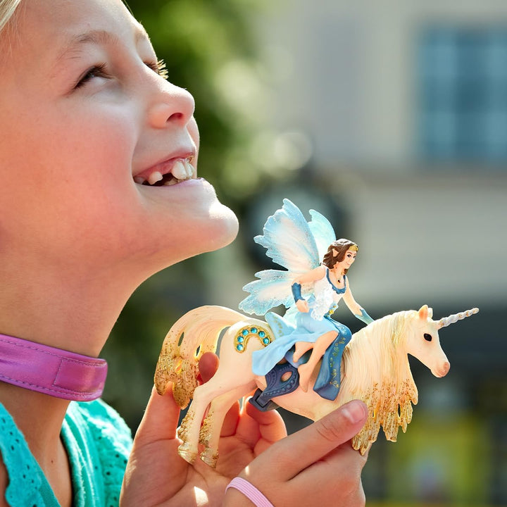 Schleich 42508 Eyela Riding on Golden Unicorn Bayala, 16 x 19 x 25.5 cm Standardverpackung, Standard