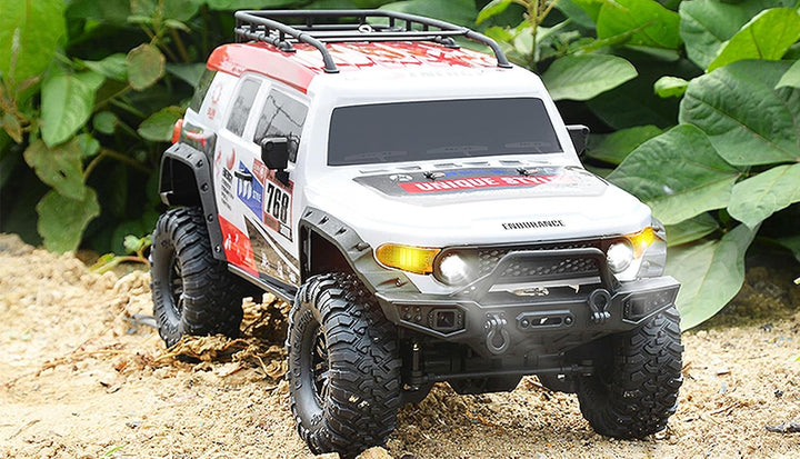 Amewi 22592 Dirt Climbing SUV Race Crawler 4WD 1:10 RTR weiss/rot, inkl. Fernsteuerung, Akku, Ladeka
