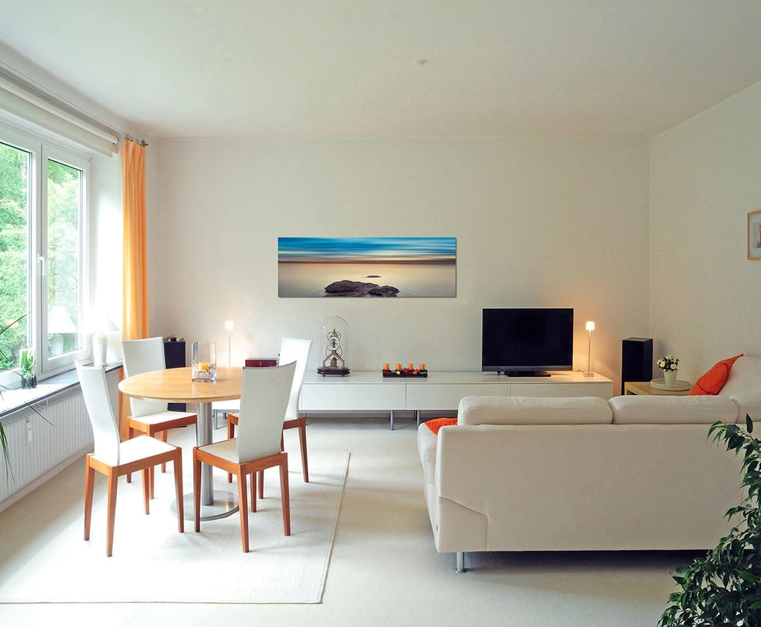 Paul Sinus Art Panoramabild auf Leinwand und Keilrahmen 150x50cm Meer Felsen Abendhimmel mystisch
