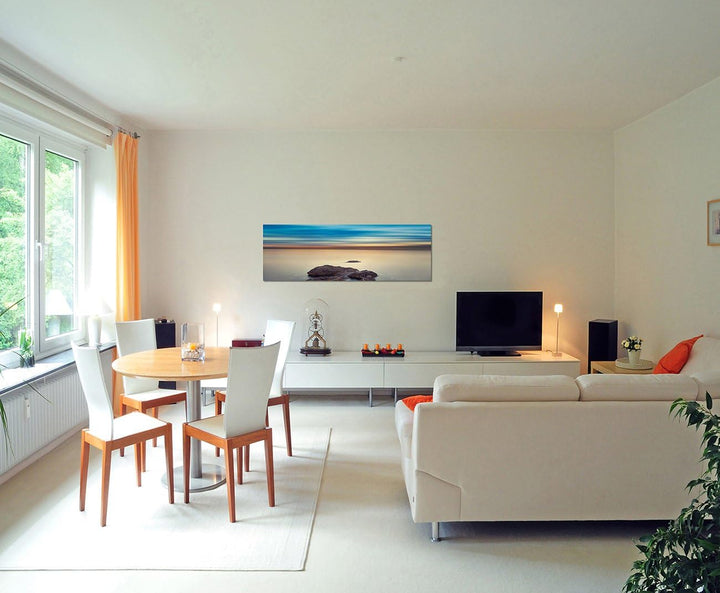 Paul Sinus Art Panoramabild auf Leinwand und Keilrahmen 150x50cm Meer Felsen Abendhimmel mystisch