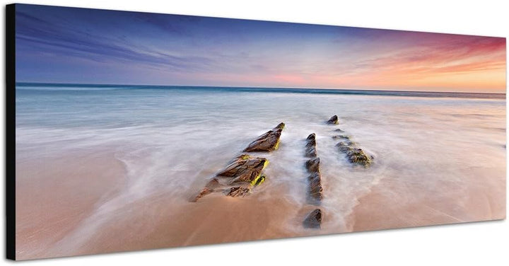 Paul Sinus Art Panoramabild auf Leinwand und Keilrahmen 120x40cm Strand Ozean Steine Horizont Abendr