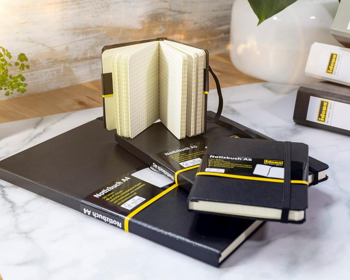Idena 209281 - Notizbuch DIN A5, kariert, Papier cremefarben, 192 Seiten, 80 g/m², Hardcover in schw