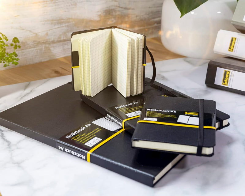 Idena 209281 - Notizbuch DIN A5, kariert, Papier cremefarben, 192 Seiten, 80 g/m², Hardcover in schw