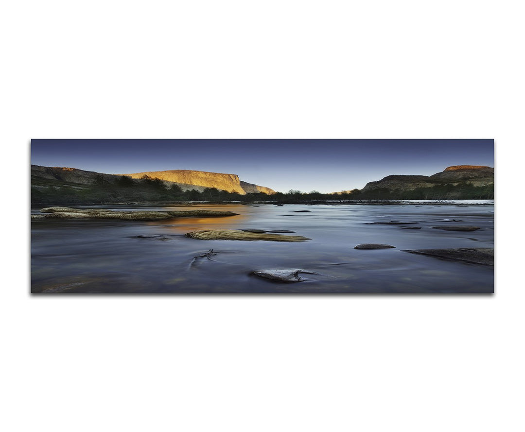 Paul Sinus Art Panoramabild auf Leinwand und Keilrahmen 150x50cm Felsen Bäume Fluss Steine Abendlich