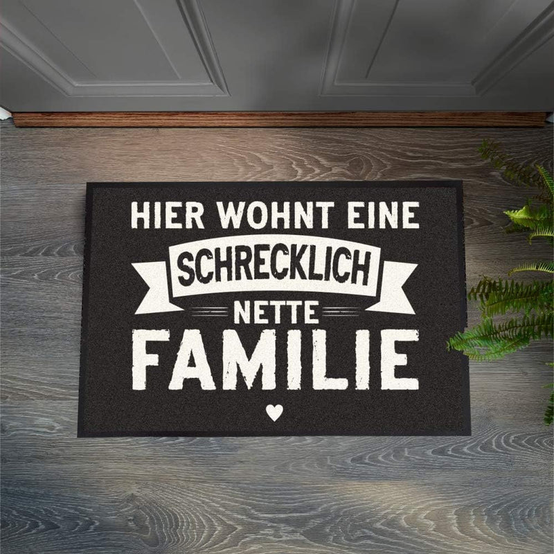 4youDesign Fussmatte -Hier wohnt eine schrecklich Nette Familie- 50x70 -lustige Fussmatte für innen&