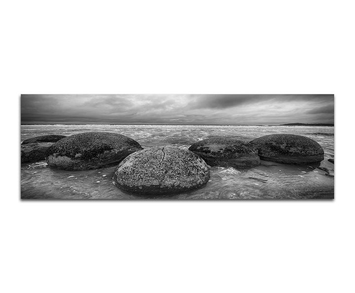 Paul Sinus Art Panoramabild auf Leinwand und Keilrahmen 150x50cm Neuseeland Steine Meer Strand schwa