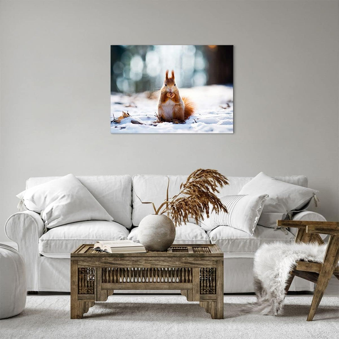 Bilder auf Leinwand Eichhörnchen Winter Schnee Essen Leinwandbild 70x50cm Wandbilder Dekoration Wohn