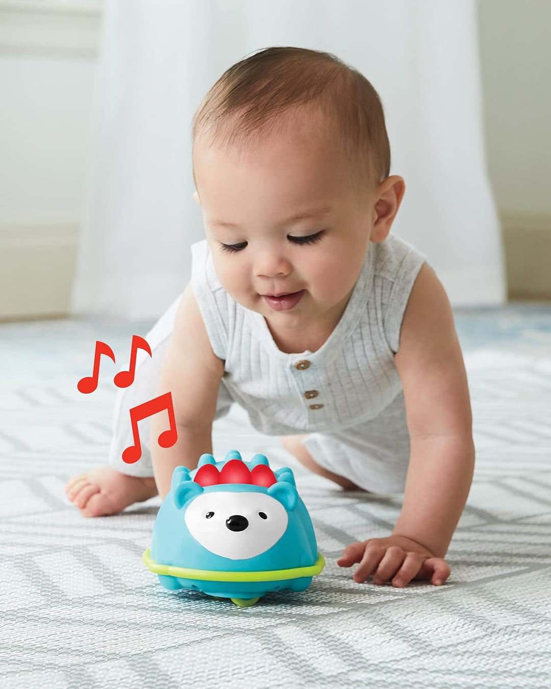 Skip Hop Explore and More Krabbelspielzeug Igel zum Krabbeln Lernen mit Licht und Musik, ab 5 Monate