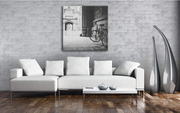 deyoli Fahrrad in einem Alten Stadtviertel im Format: 70x70 Effekt: Schwarz&Weiss als Leinwandbild,