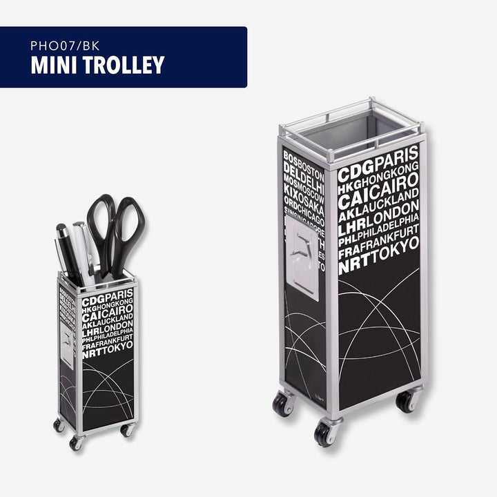 TROIKA Stifteköcher MINI TROLLEY - PHO07/BK - Stifteköcher, Trolley, Motiv "AIRPORTS" - schwarz / we