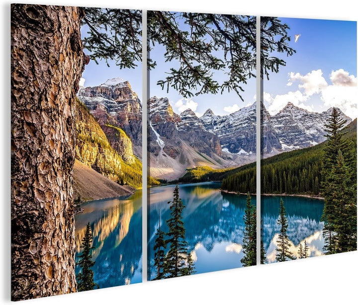 islandburner Bild auf Leinwand Landschaftsansicht des Morain Sees und des Gebirgszugs mit Baum im Vo