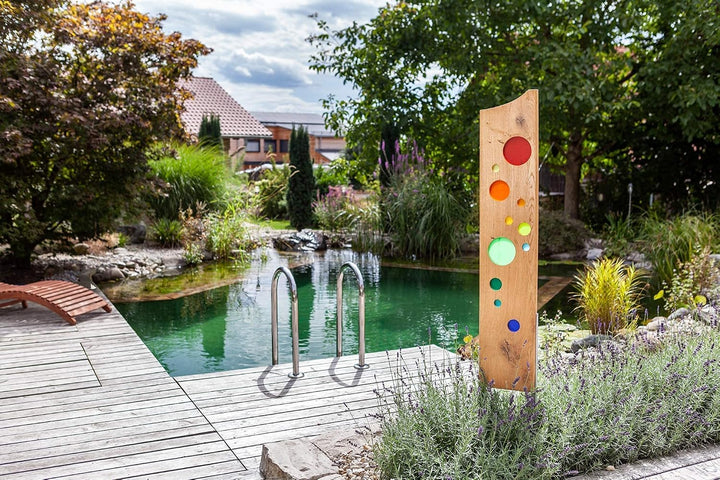 Gartenskulptur aus Holz und Glas. Gartendekoration als Unikate handgefertigt und wetterfest