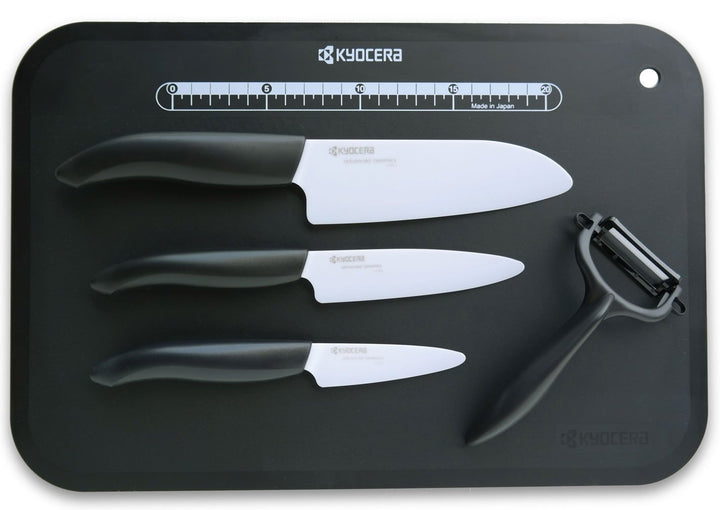 Kyocera Keramikmesser Set- 3 Messer Griff schwarz + Keramikschäler + Schneidunterlage Fb. schwarz