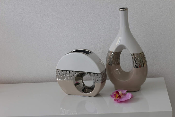 Dekohelden24 Moderne Deko Designer Keramik Vase oval mit Loch in Cappuccino/Silber/weiss. Masse L/B/