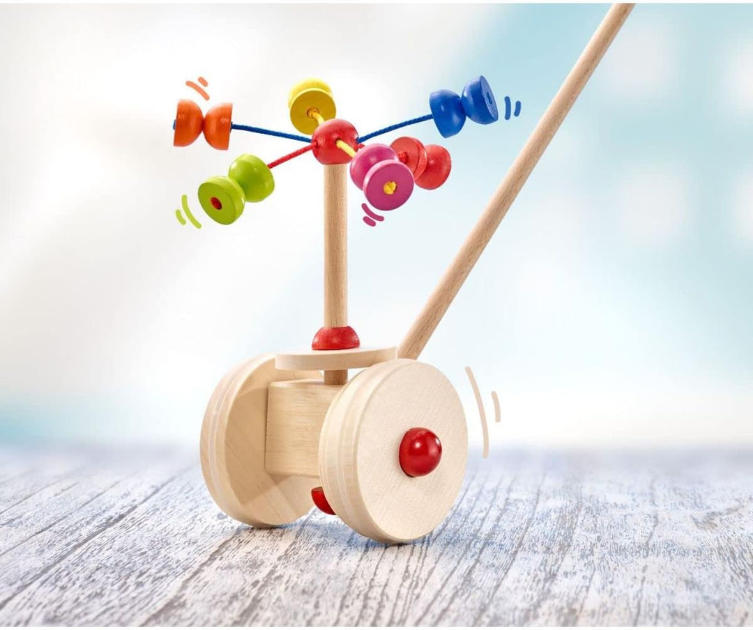 Selecta 62031 Karussell, Schiebefigur, Schiebe-und Nachziehspielzeug aus Holz, 20 cm