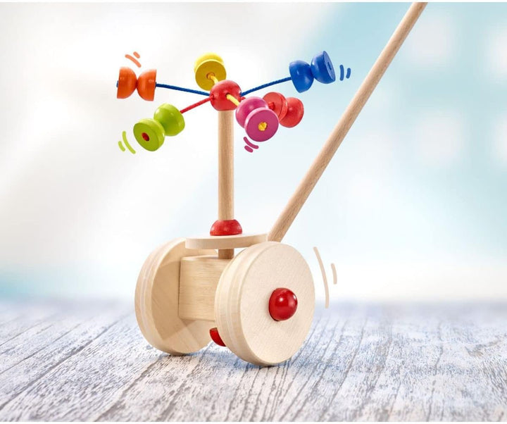 Selecta 62031 Karussell, Schiebefigur, Schiebe-und Nachziehspielzeug aus Holz, 20 cm
