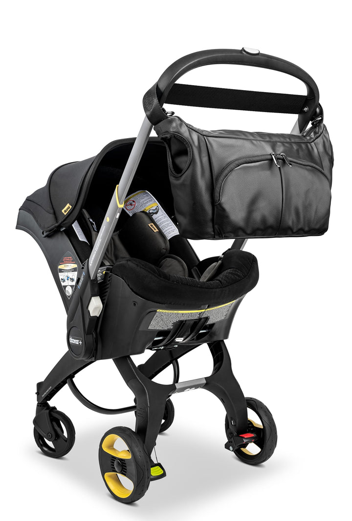 Essentials Wickeltasche, kompatibel mit dem Doona Autositz/Kinderwagen, Schwarz Kunstleder, Kunstled