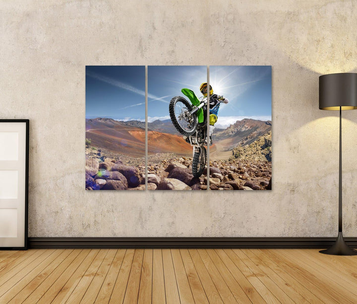 islandburner, Bild auf Leinwand Professioneller Dirt-Bike-Fahrer, der auf Vulkan rollt. Wandbild Pos
