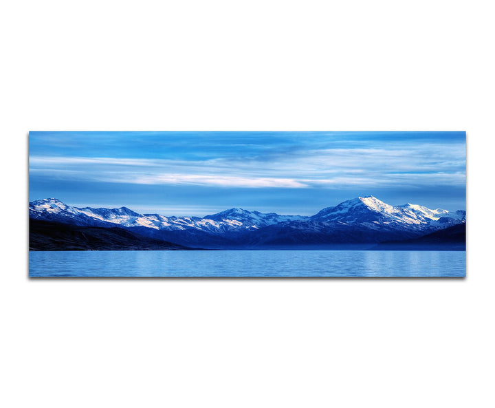 Paul Sinus Art Panoramabild auf Leinwand und Keilrahmen 150x50cm Berge Schnee Wasser Wolkenschleier
