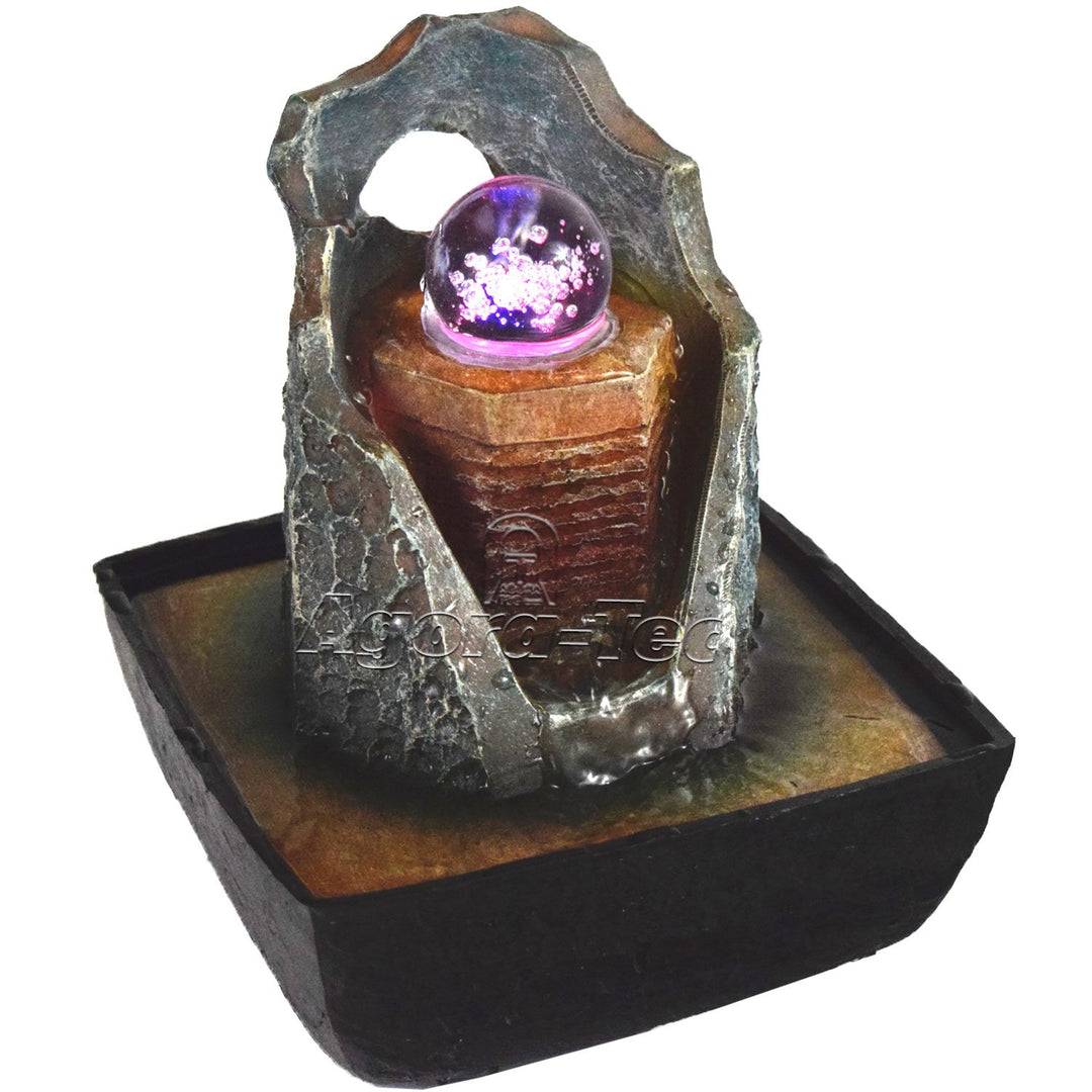 Agora-Tec® Wasserspiel &amp; Zimmerbrunnen Magic mit drehender Glaskugel mit Vier Farben LED Beleuchtung