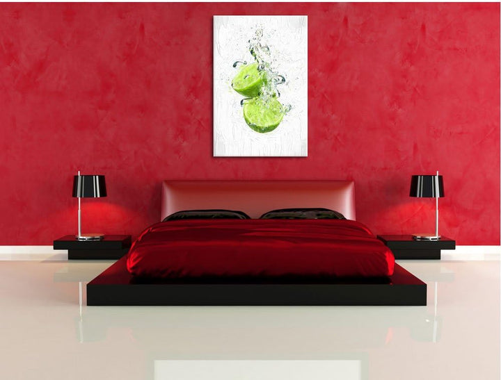 Pixxprint Limette fällt in Wasser / 100x70cm Leinwandbild bespannt auf Holzrahmen/Wandbild Kunstdruc
