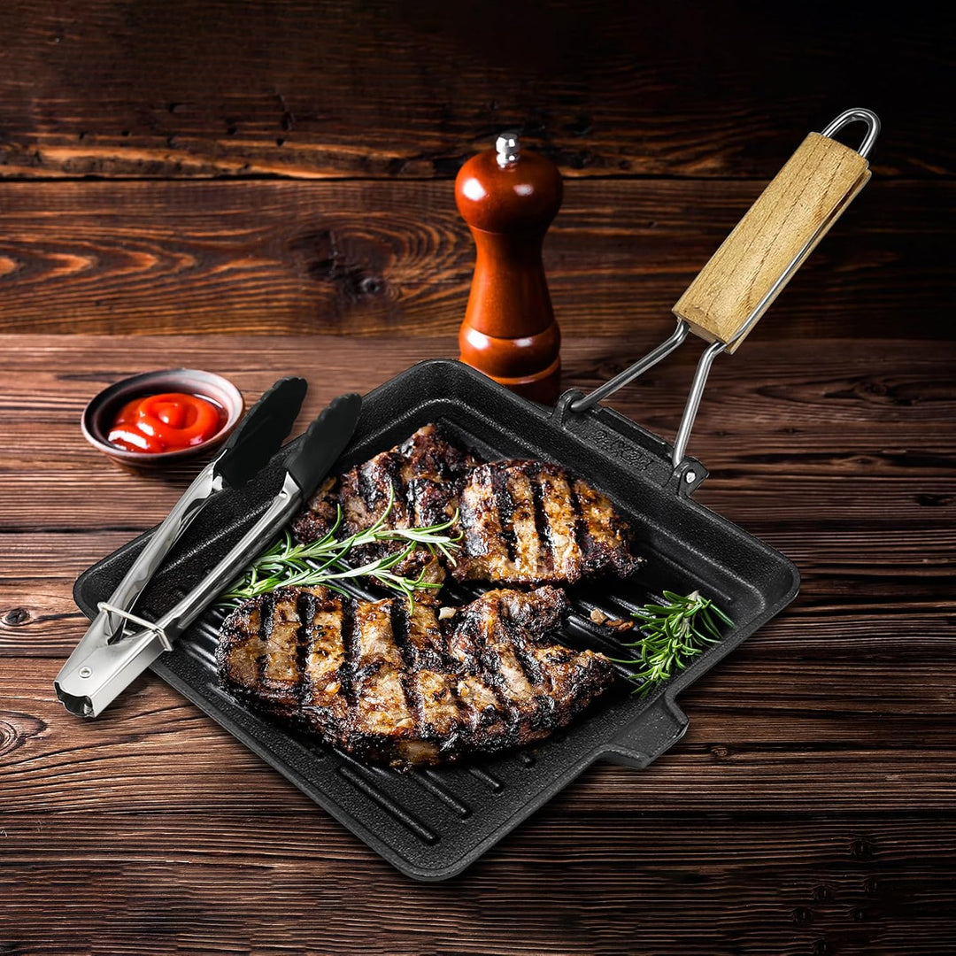 AWAOVV Steakpfanne Gusseisen,23x23cm Grillpfanne mit Klappbarem Holzgriff und Lebensmittelclips,Klap