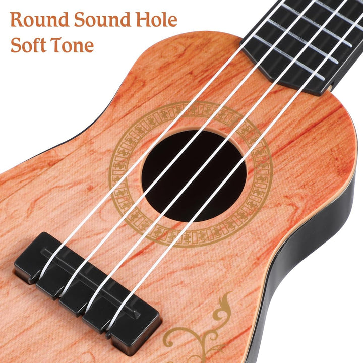 SAFIGLE 25cm Gitarre für Kinder：Mini Kindergitarre Ukulele Spielzeug 4-Saitige Musikgitarre Modell -