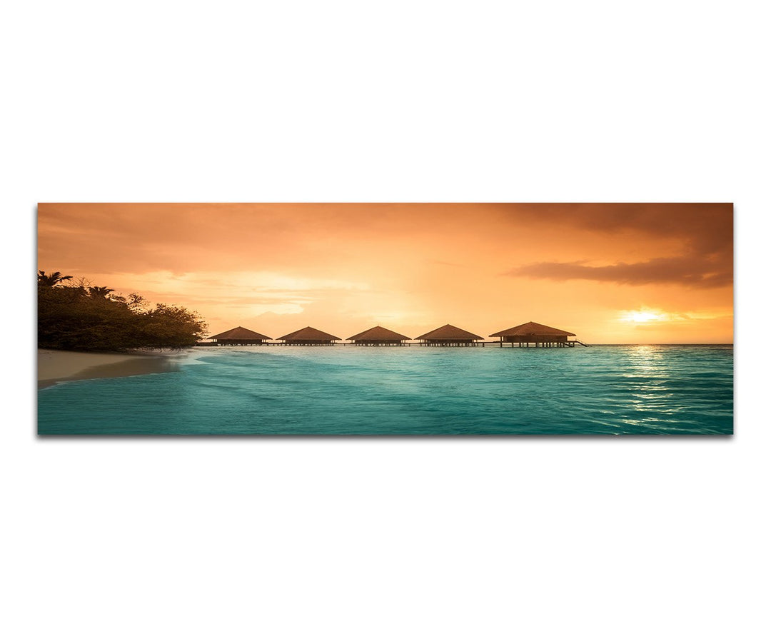 Paul Sinus Art Panoramabild auf Leinwand und Keilrahmen 150x50cm Meer Strand Steg Bungalows Abendson