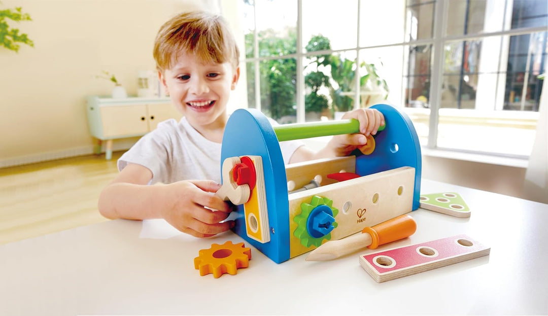 Hape Werkzeugkasten - aus Holz mit Zubehör, farbenfrohe Werkbank Hammerspielset für Kinder, Motorik-