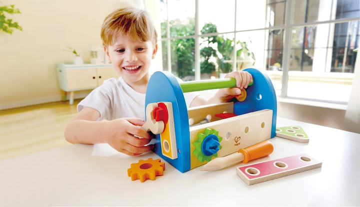 Hape Werkzeugkasten - aus Holz mit Zubehör, farbenfrohe Werkbank Hammerspielset für Kinder, Motorik-